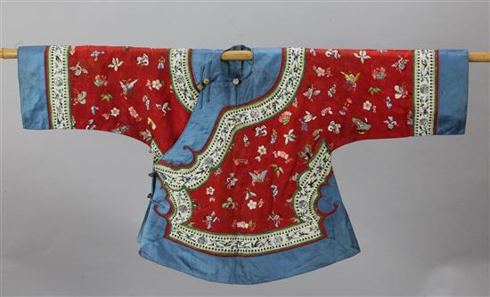 A Chinese red silk damask jacket, c. 1880-1910, length 58cm